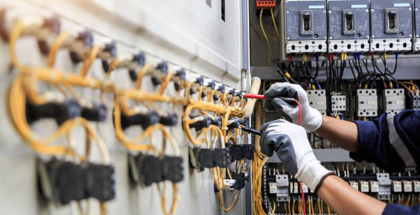 Professional Electrician technician working in Simsbury Center, CT